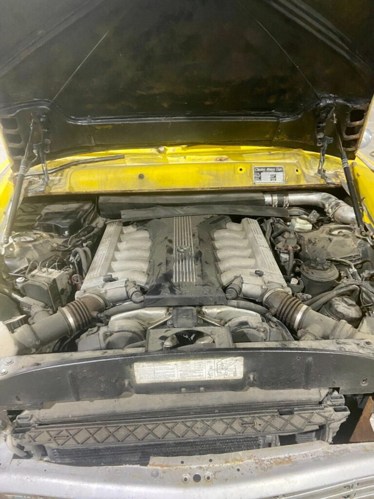  You Could Burn Cash Or Buy This BMW 750iL V12 With A Checker Taxi Cab Body