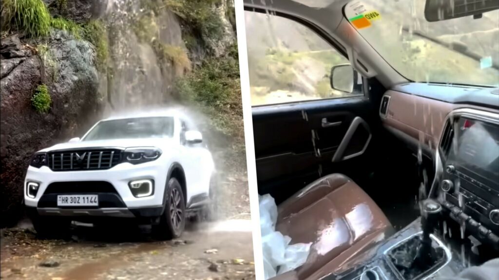  Mahindra SUV Goes Under Waterfall, Driver Gets More Than Just A Shower With Leaking Roof