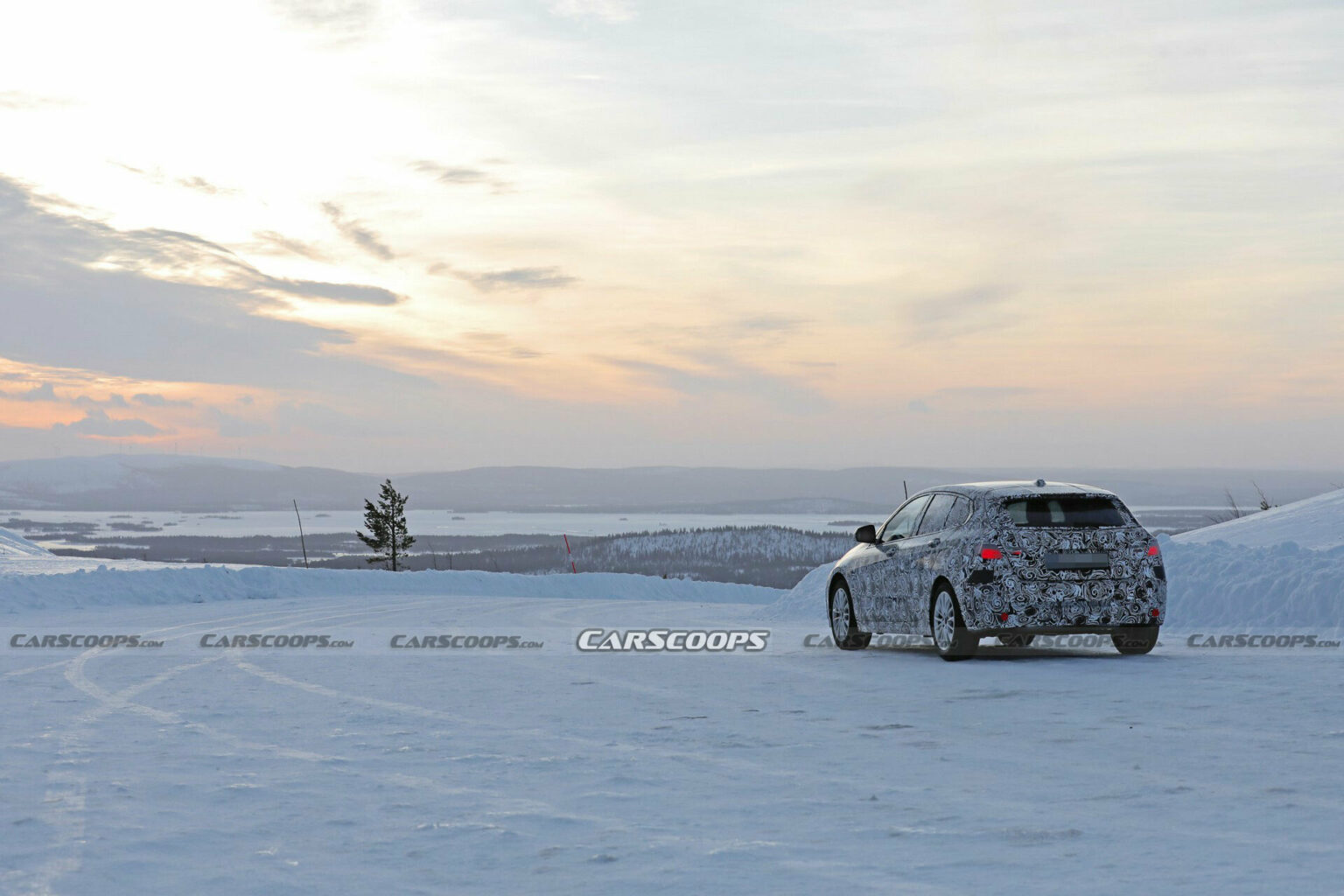 2025 BMW 1-Series Spied Alongside The Current Model | Carscoops