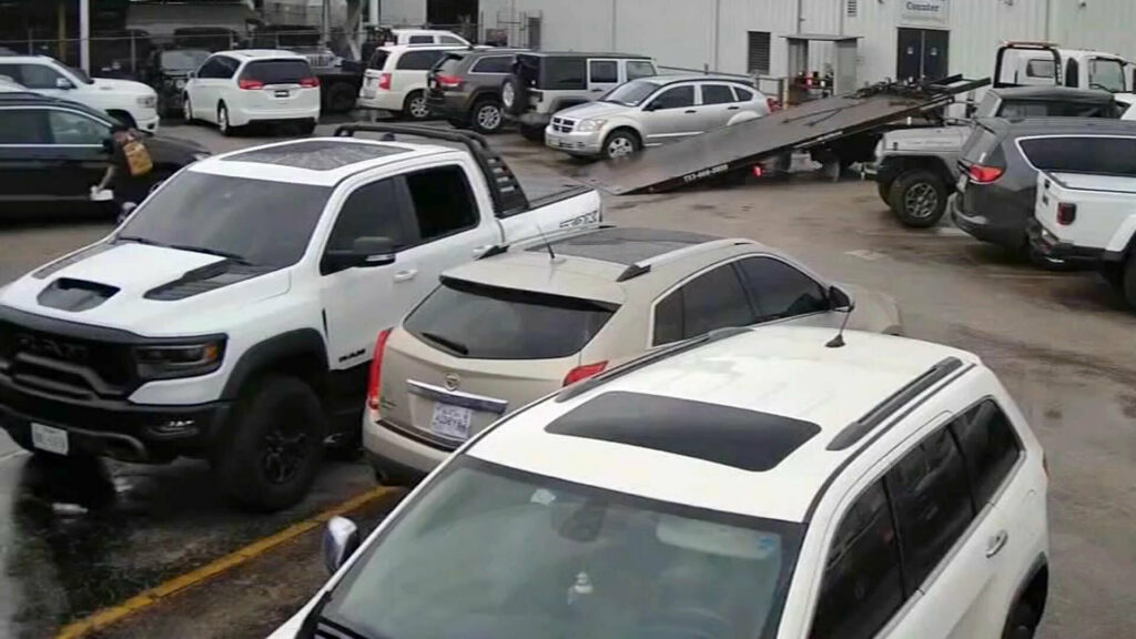  Watch Brazen Thieves In Stolen Cadillac Steal RAM TRX From Dealer During Business Hours