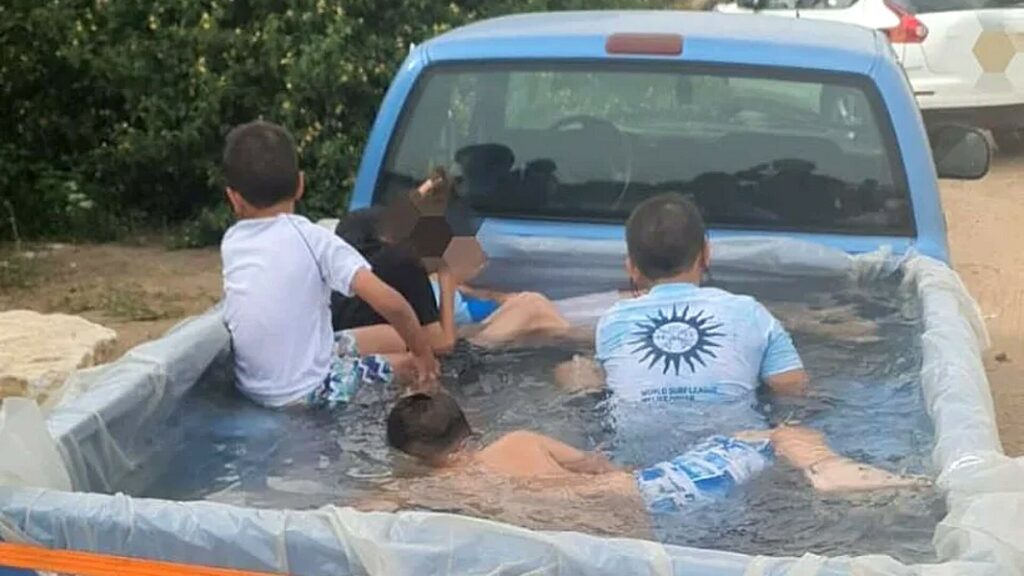  Pool-Converted Pickup With Kids Playing While In Motion Gets Pulled Over By The Police In Israel