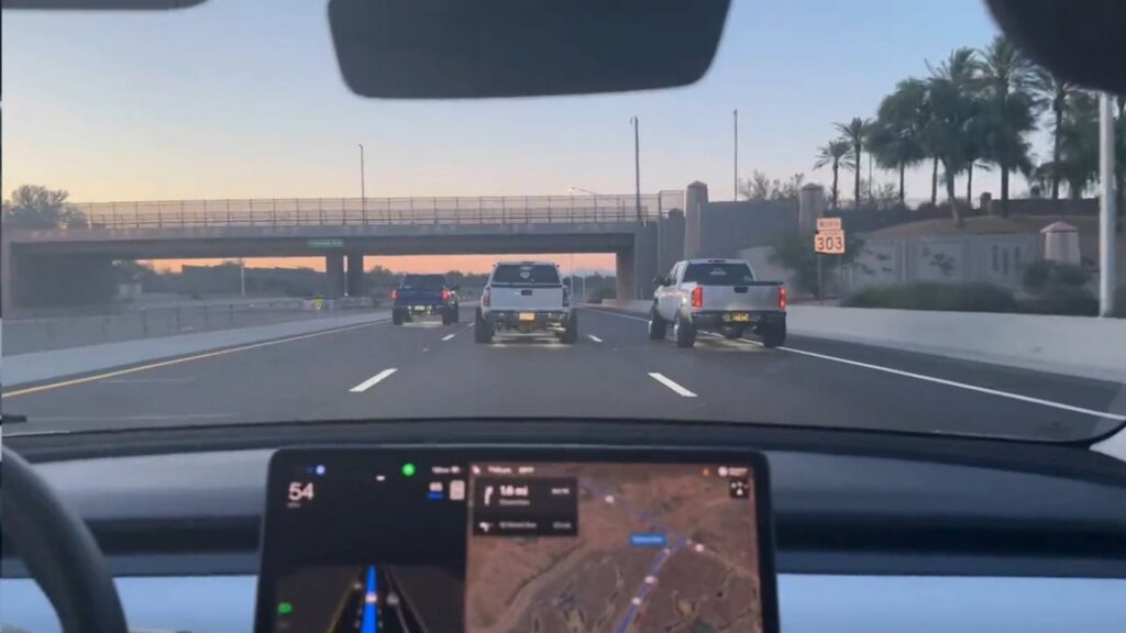  Trio Of Diesel Pickups Appear To Intentionally Blockade Highway, Coal Roll Tesla