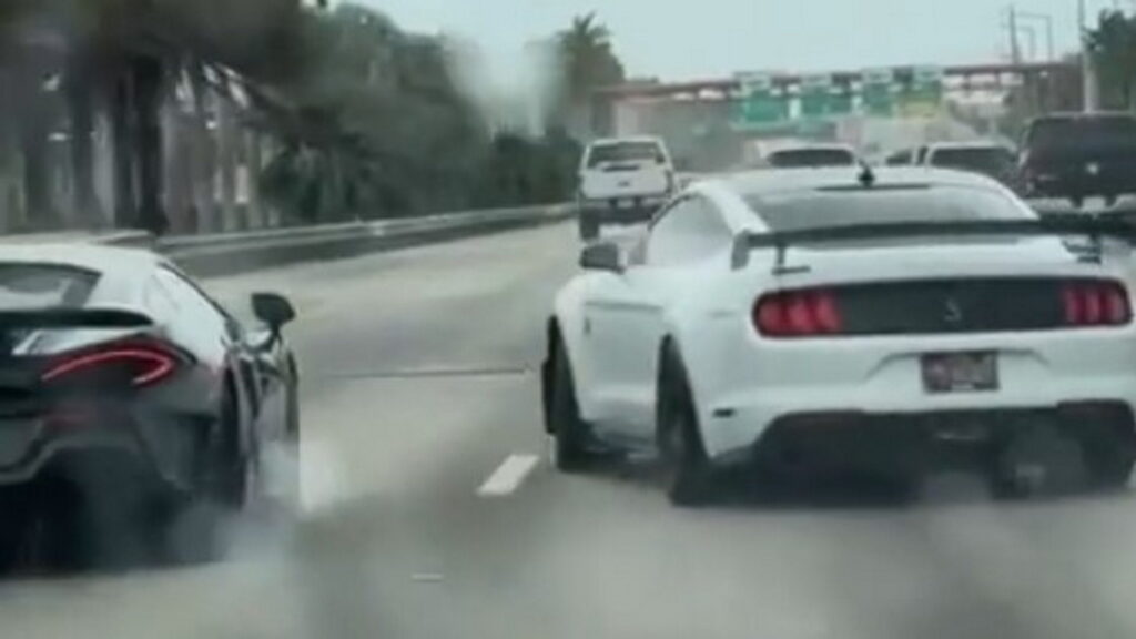  Mustang Driver Fishtailing On Wet Road Manages Not To Hit Nearby McLaren – Or Anything Else