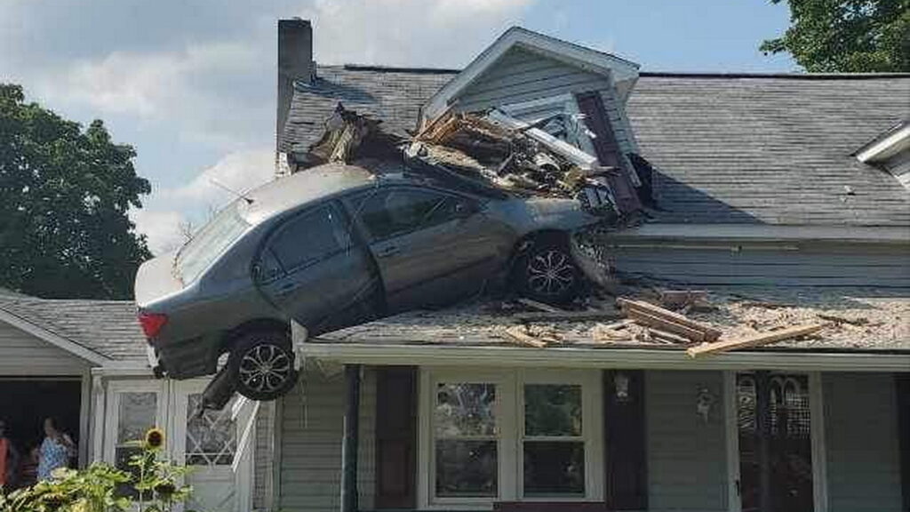  Toyota Corolla Launches Off Culvert Into Second Story Of House In Crash That May Have Been Intentional