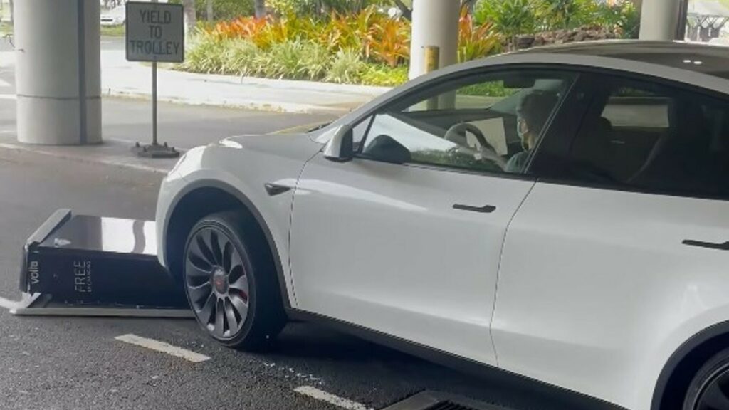  Tesla Driver Runs Over Charging Station And Seems Not To Notice