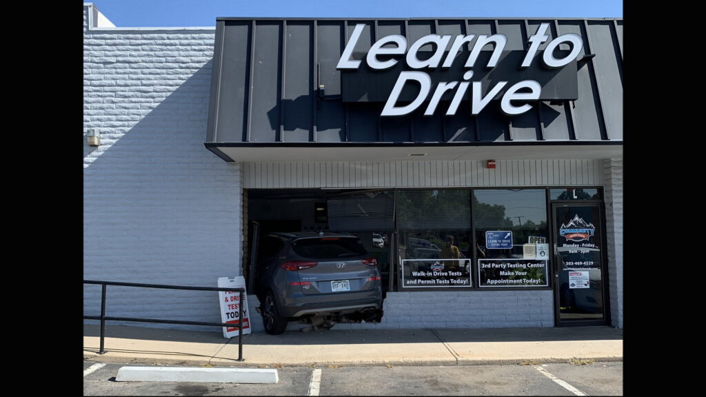  Instructor Embarrassingly Plows Through Front Of Driving School