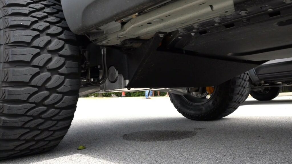 Rivian R1T With Lifted Suspension And 38inch Tires Faces The Ram 1500