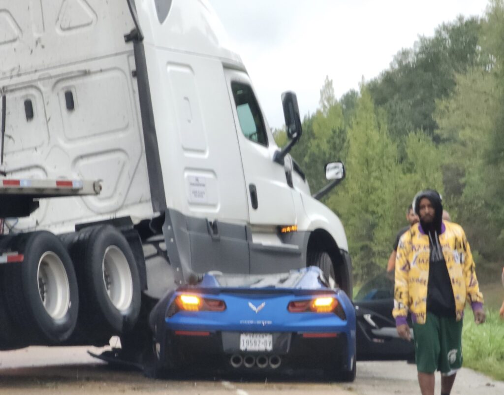  Corvette Occupants Miraculously Walk Away After Being Crushed Under 18-Wheeler Truck