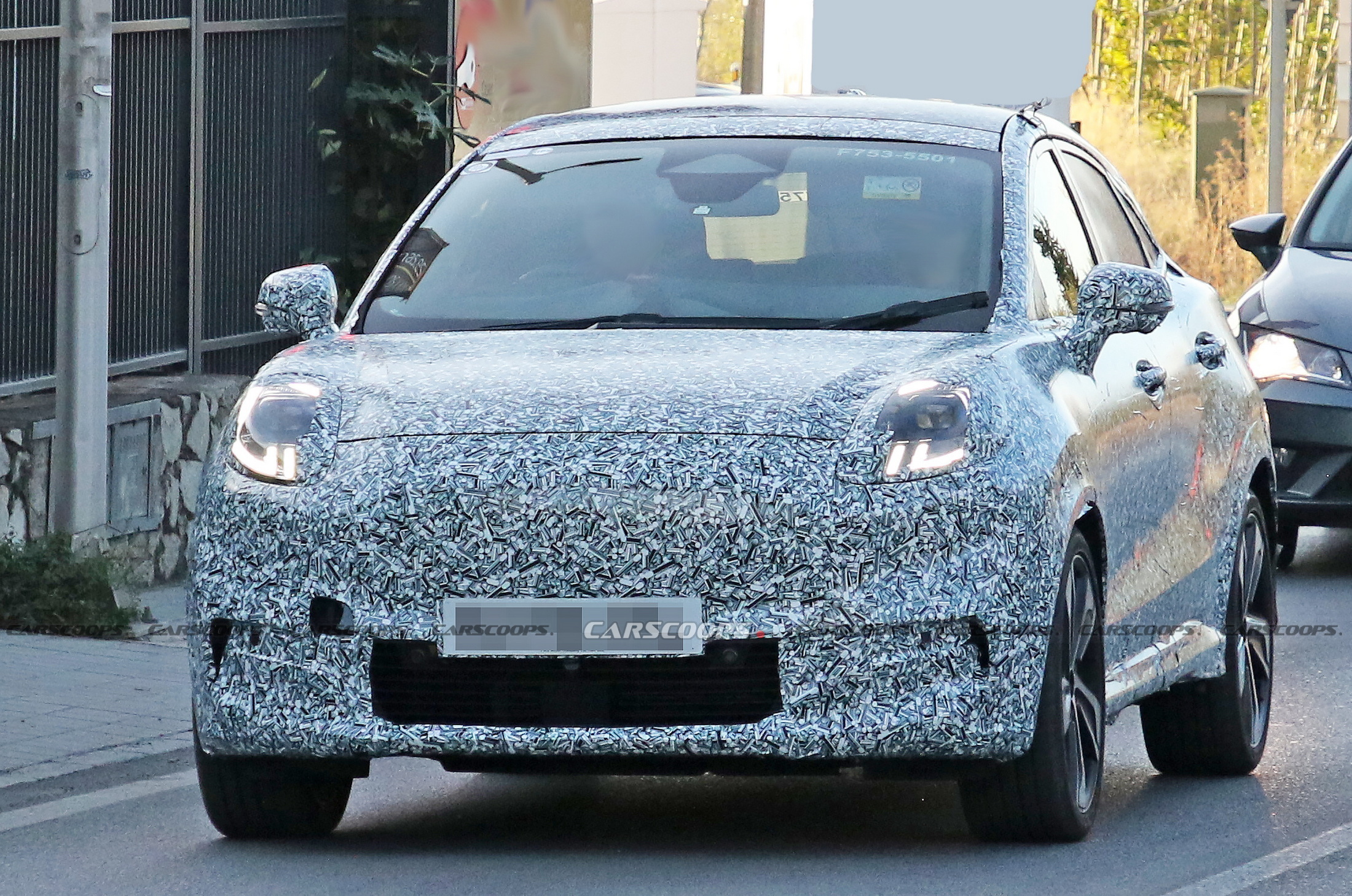 Facelifted Ford Puma Spied In EV Form, Flaunting Its Covered