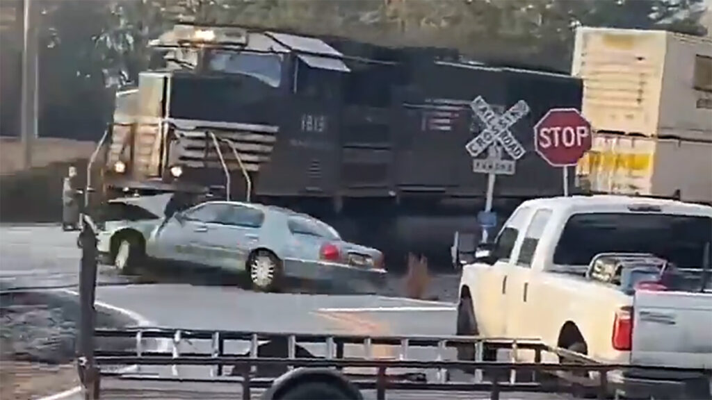  Train T-Bones Lincoln Town Car Stuck On Tracks, Occupants Flee Just In Time
