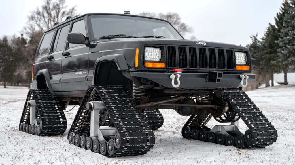  Snow Plows? Nah, This Tracked Jeep Cherokee Eats Blizzards For Breakfast