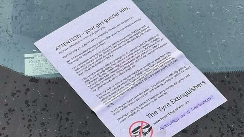  Climate Activists Vandalized A Tesla SUV Leaving ‘Your Gas Guzzler Kills’ Flyer Behind