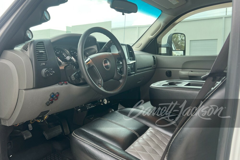  What The Truck? This 2008 GMC Sierra Has 6 Doors And 9 Seats