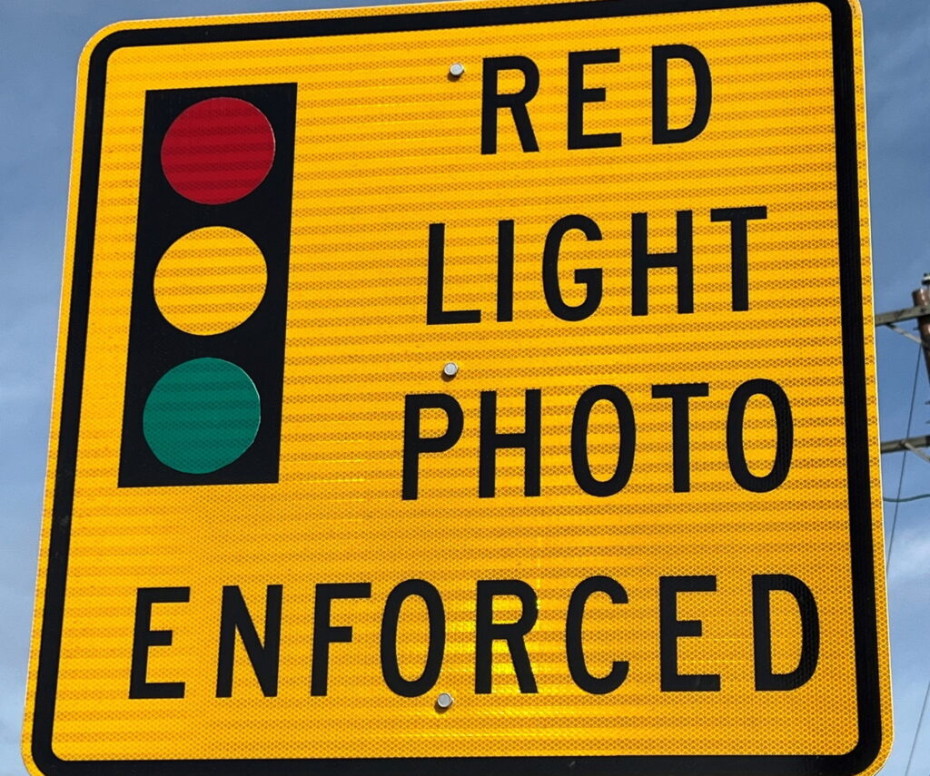     Two cameras blast 5,200 drivers running red lights in a month!