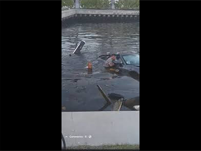     Another Porsche is floating!  This time a 911 convertible in a canal