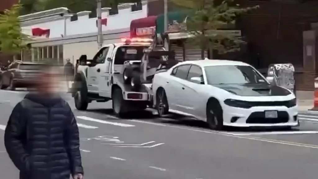  Dodge Charger Tearing Down NYC Sidewalk Meets Officer Karma