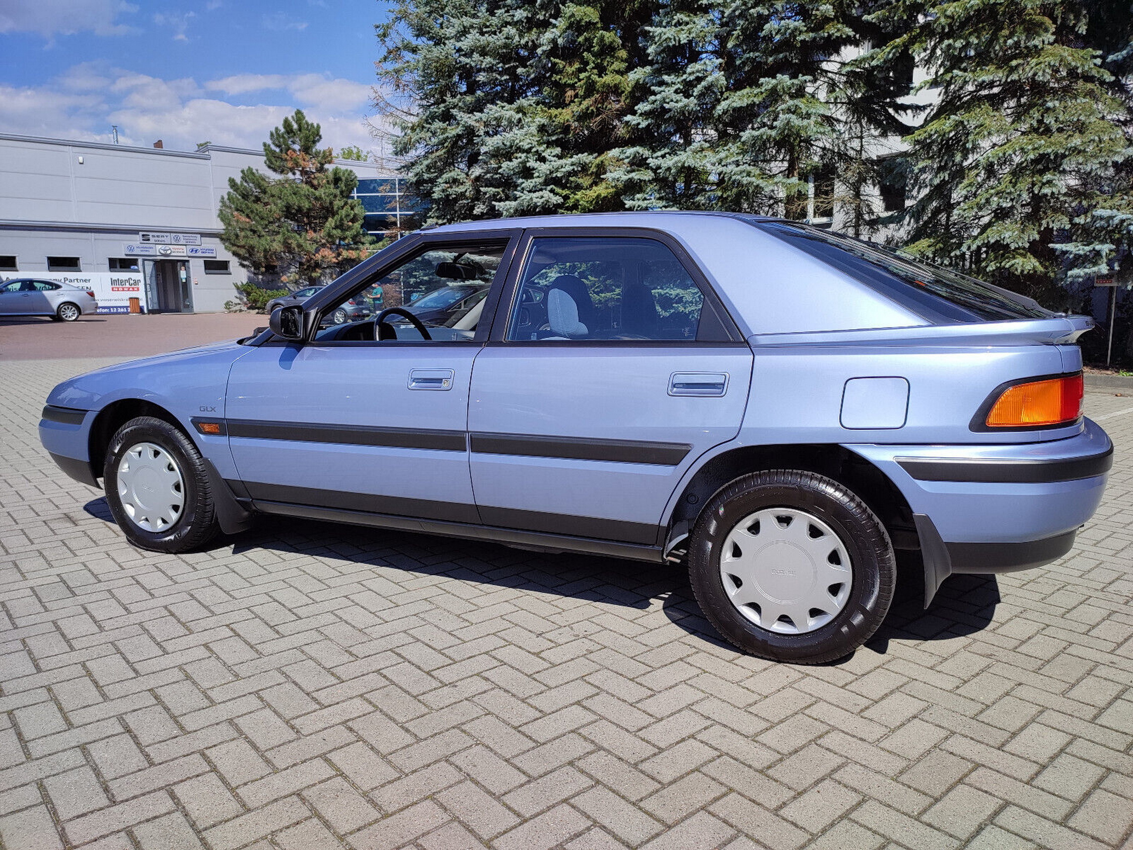eiki  Like-New 1990 Mazda 323F Emerges After Decades In Dealer Storage