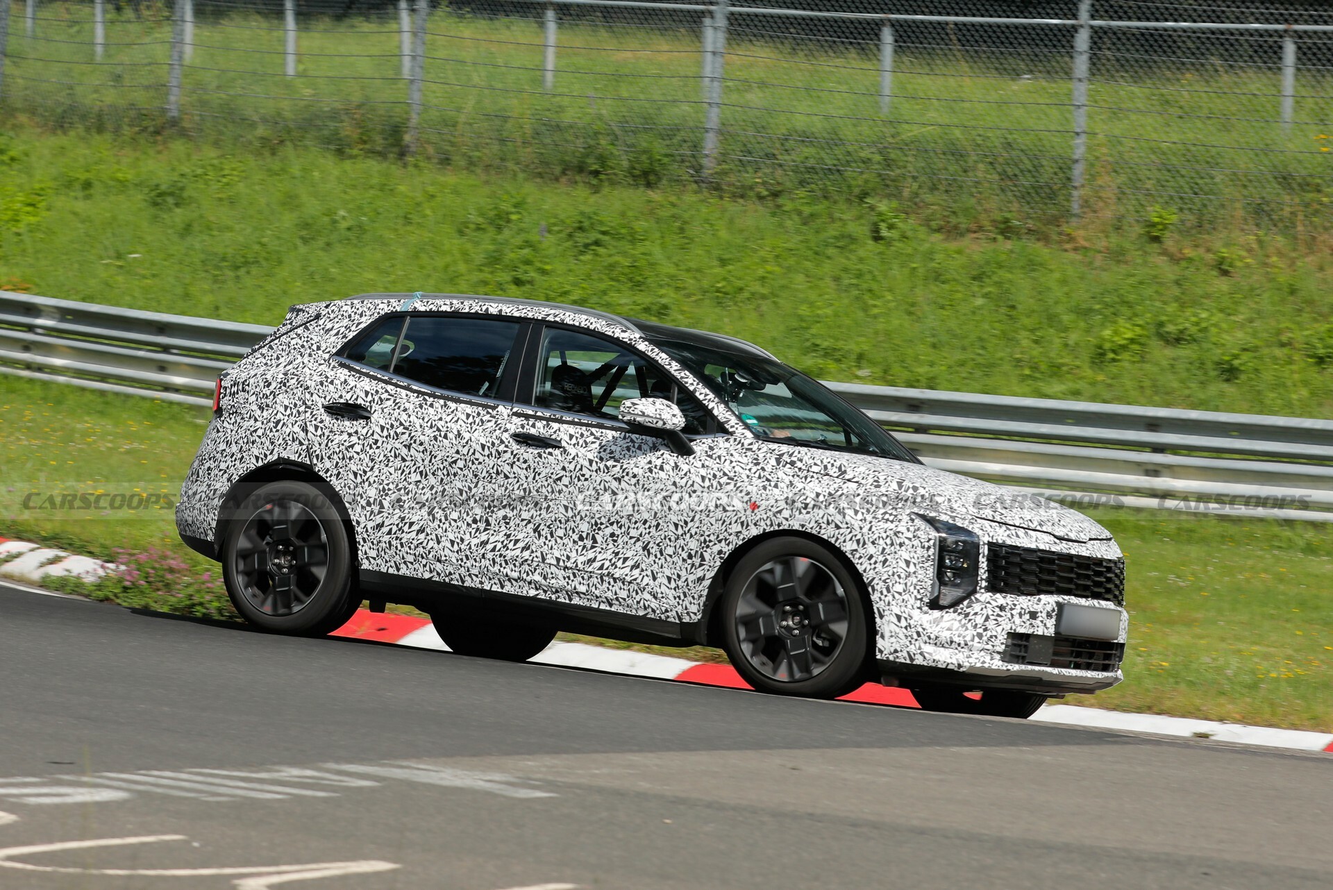  2026 Kia Sportage Shows Its Boxy New Face And Vertical Headlights Motiv 