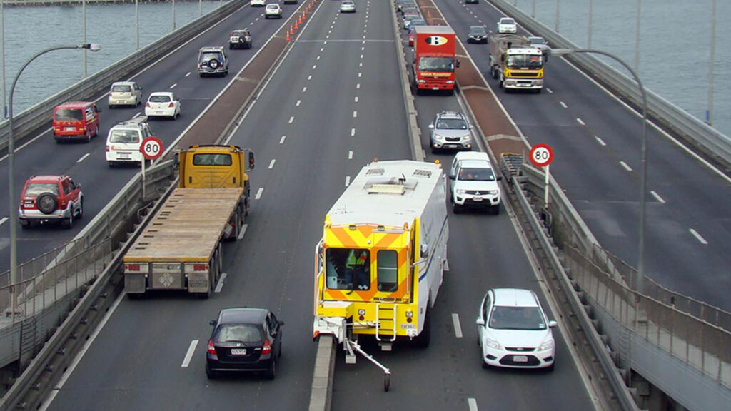  This Machine Poops Barriers To Stop Roads Getting Backed Up