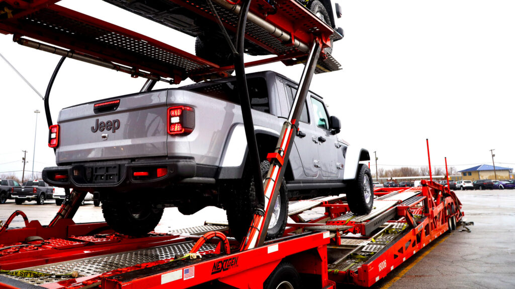  Scammers Keep Tricking Dealers Into Loading Six-Figure Cars Onto The Wrong Trucks