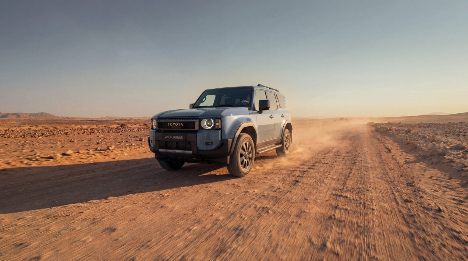 2026 Toyota Land Cruiser in motion on a desert road