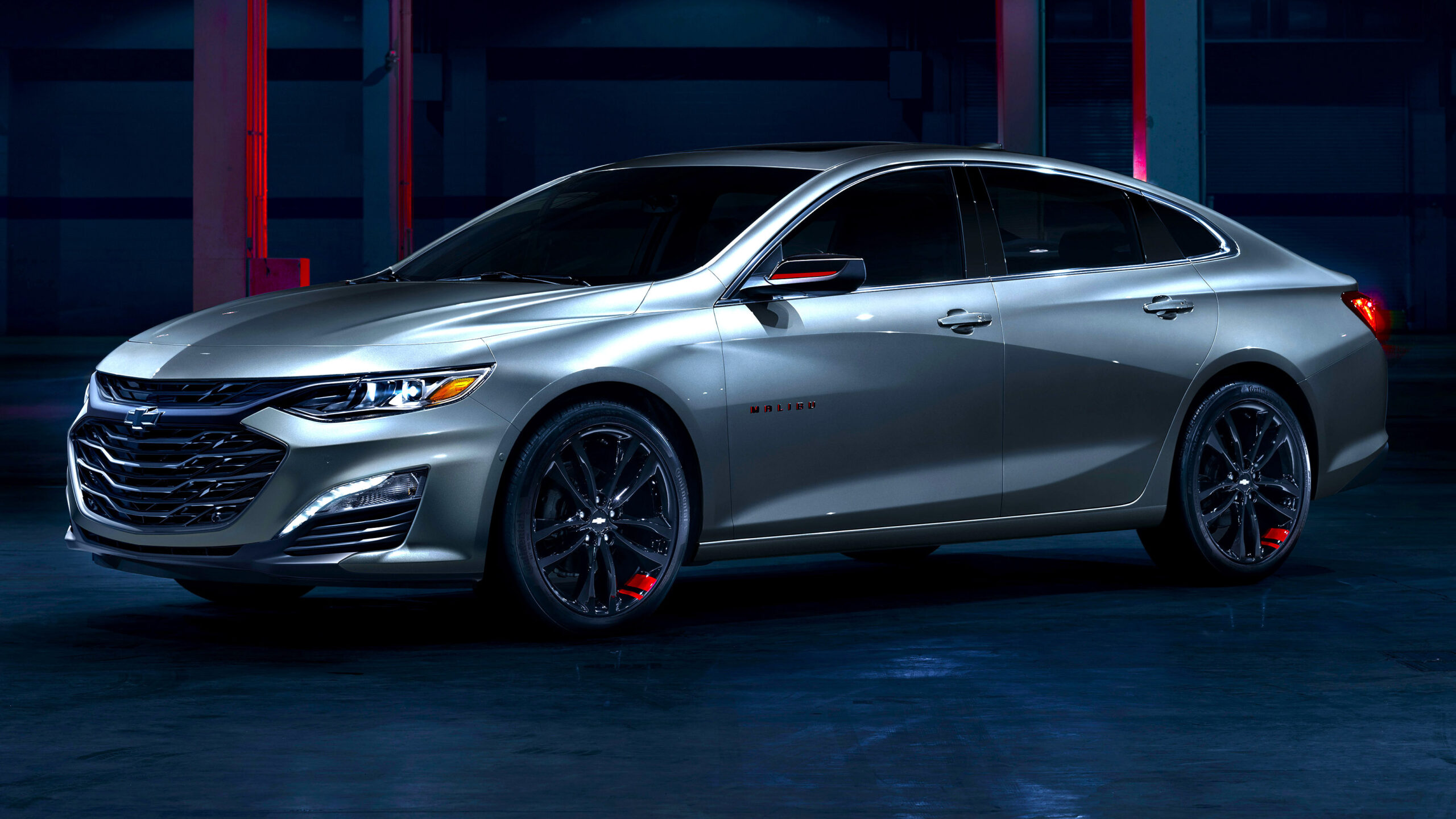 2025 Chevrolet Malibu parked showing front grille and headlights