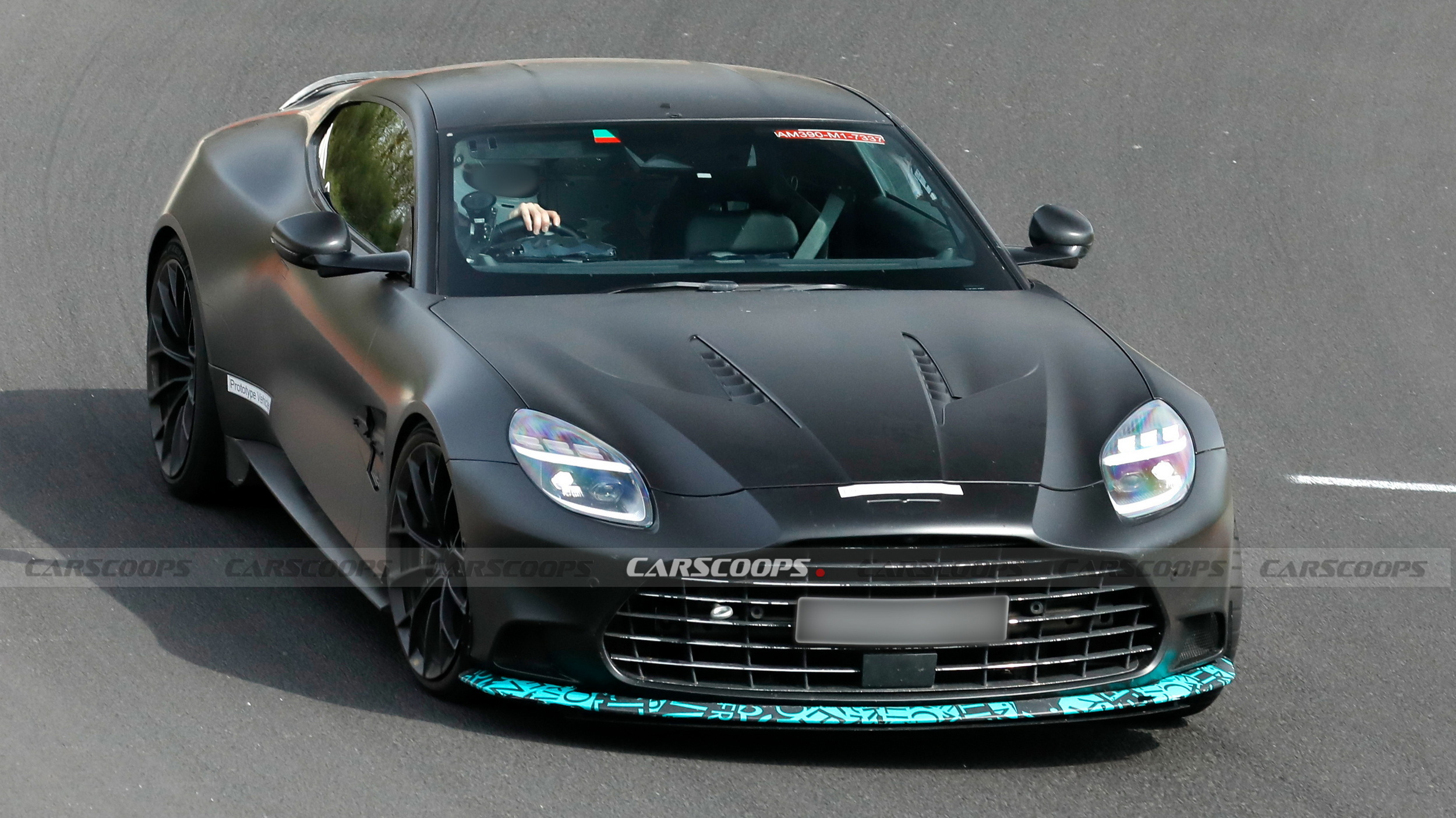 The Standard Vanquish Has 824 HP And Four Exhausts. Aston Apparently Wants More Of Both
