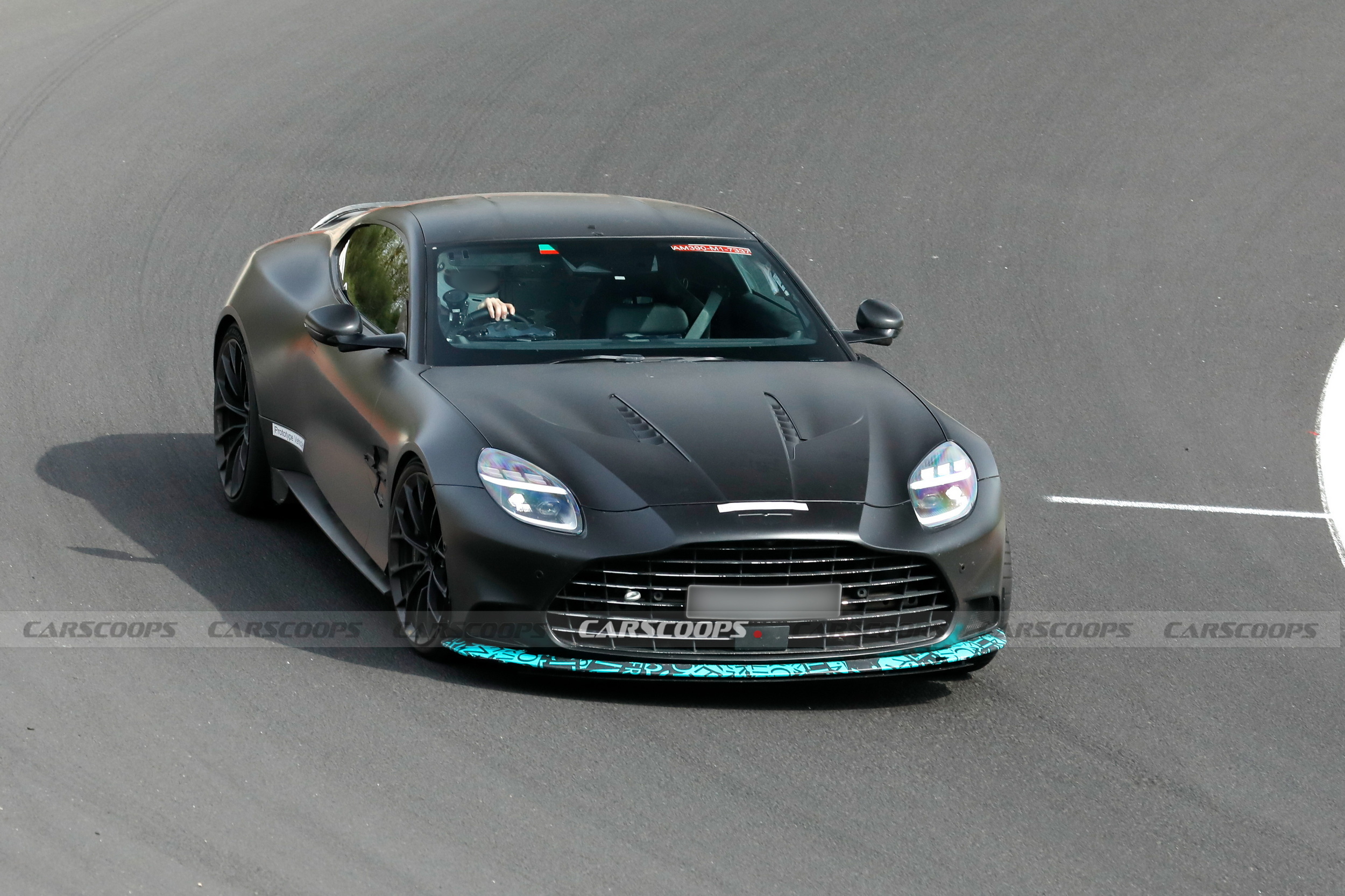 The Standard Vanquish Has 824 HP And Four Exhausts. Aston Apparently Wants More Of Both