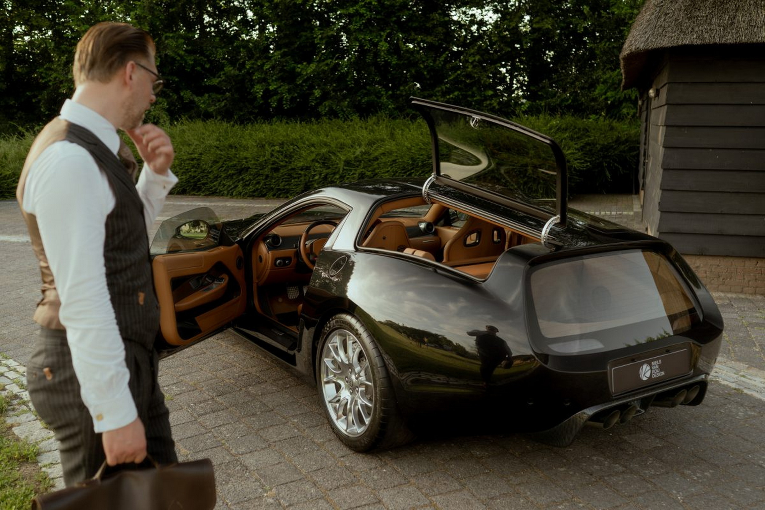 Most Wagons Load At The Back, This One-Off Ferrari Loads Through Butterfly Windows