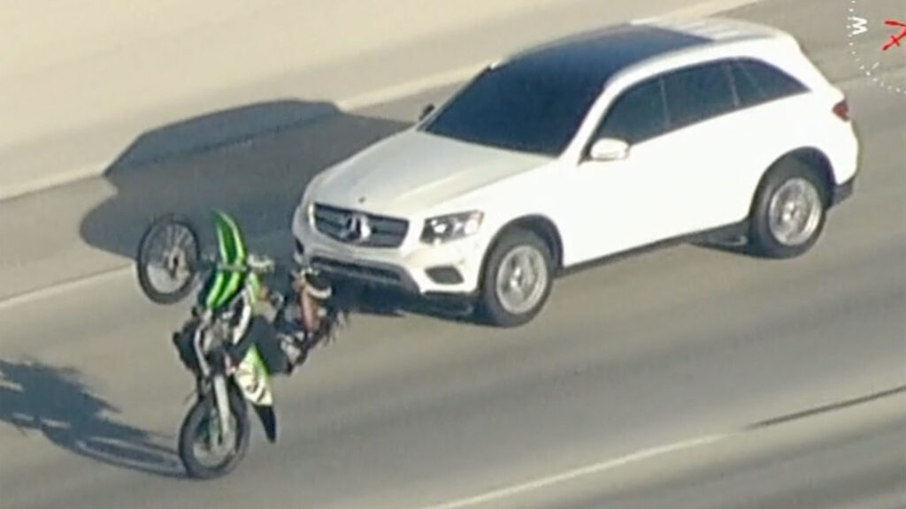  Bikers Wandered Into An LAPD Chase And Started Popping Wheelies Around Mercedes