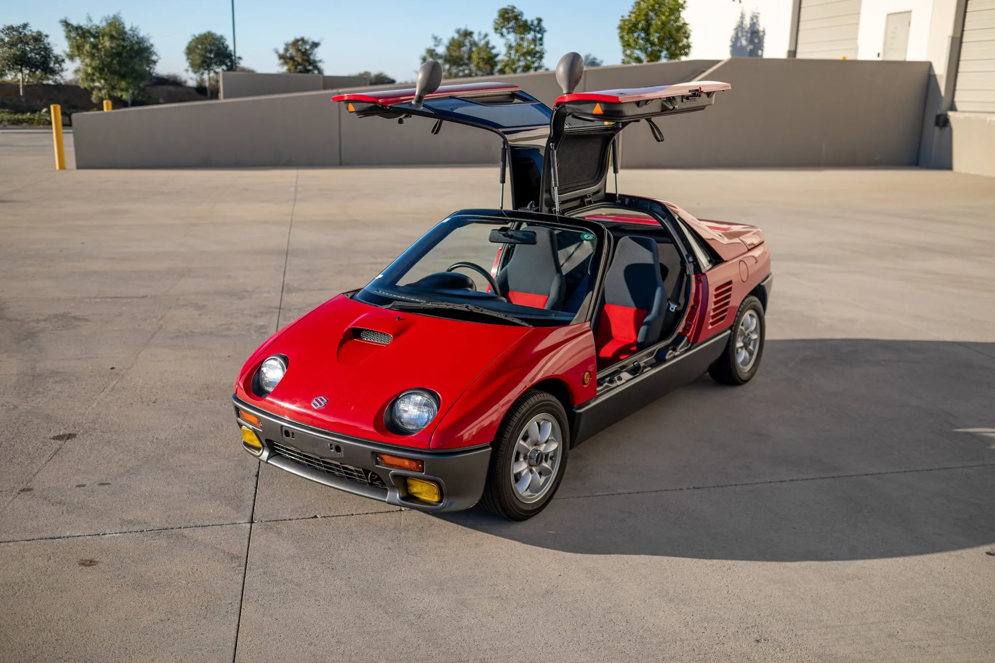 Suzuki's Tiny Mid-Engine Supercar Has Gullwing Doors And Just 64