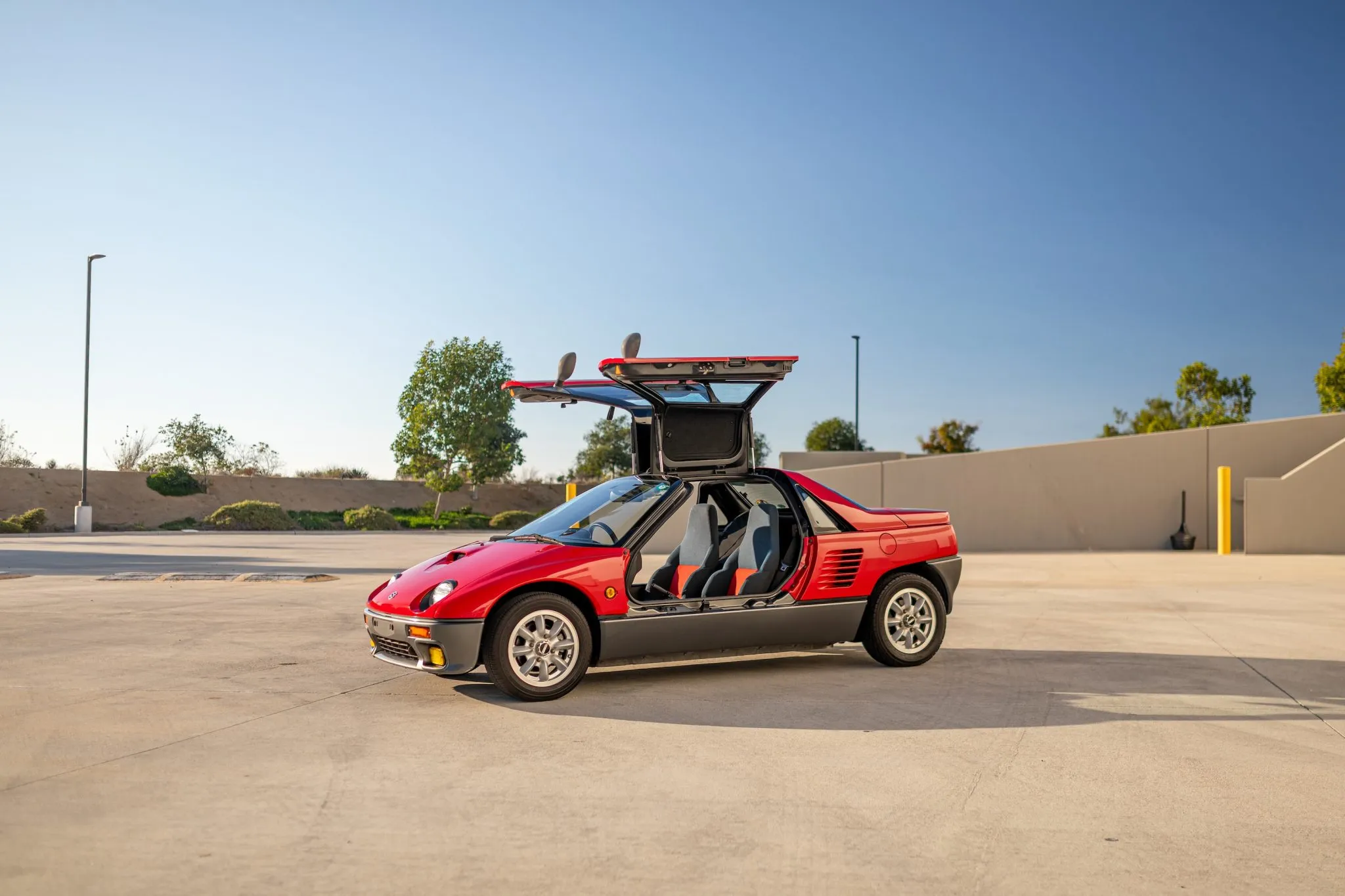 Suzuki's Tiny Mid-Engine Supercar Has Gullwing Doors And Just 64