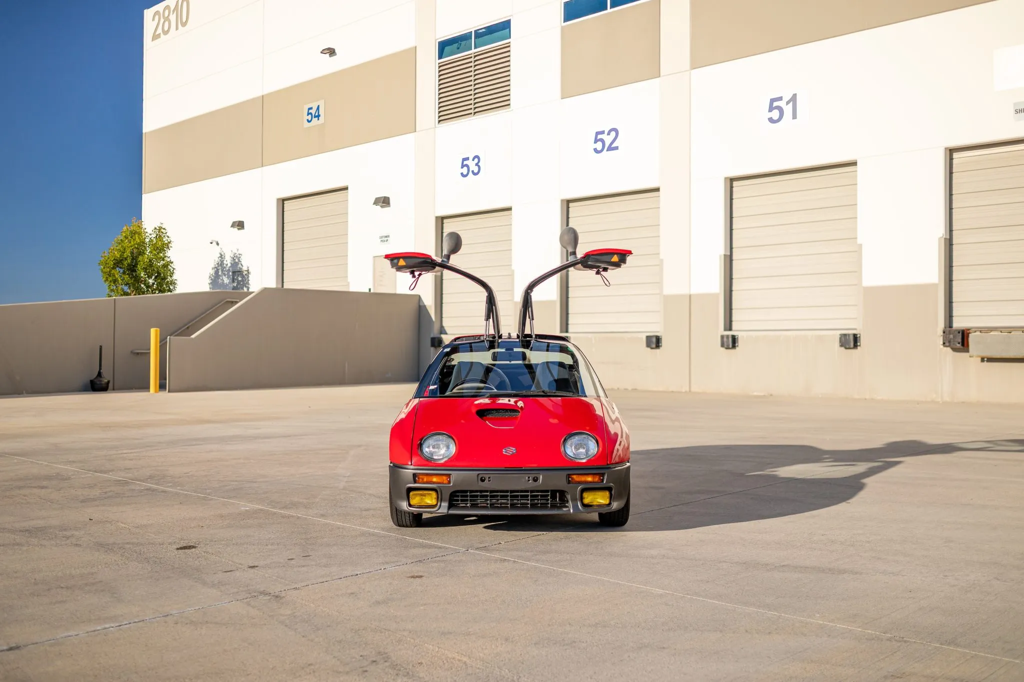 Suzuki's Tiny Mid-Engine Supercar Has Gullwing Doors And Just 64