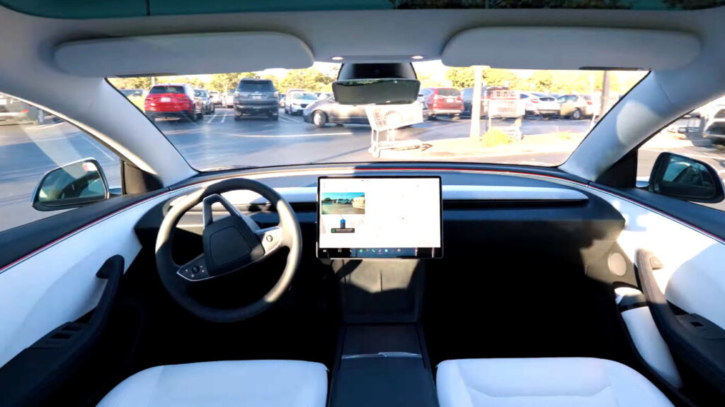  A Tesla Robotaxi Got Boxed In By Bollards, So It Bulldozed Its Way Out