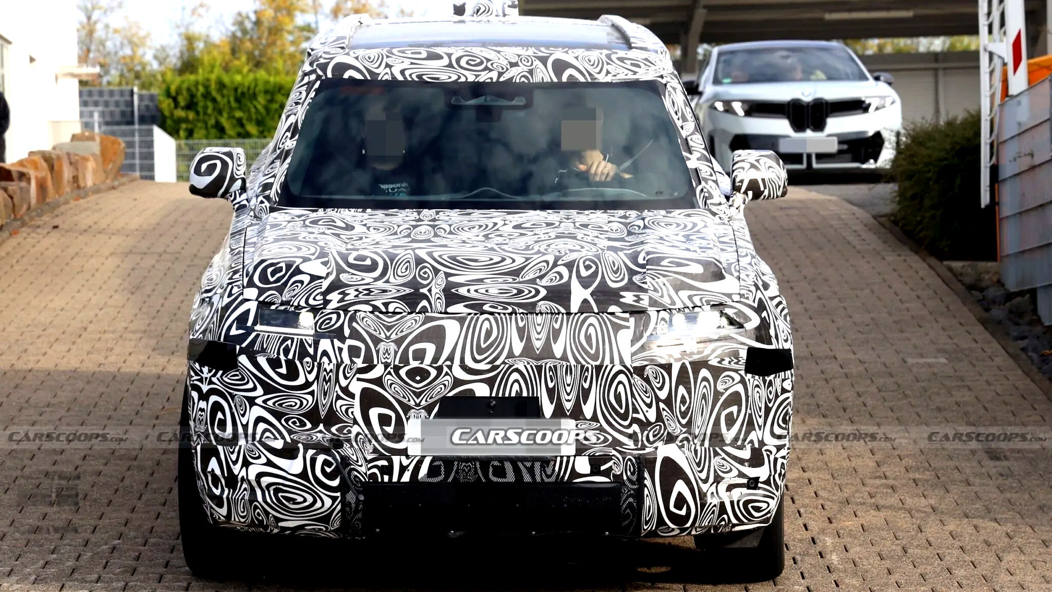 carscoops.com - Chris Chilton - Land Rover's Baby Defender Borrows A New But Old Design Trick From Big Brother
