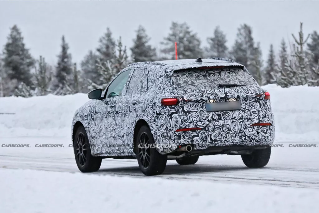 https://www.carscoops.com/wp-content/uploads/webp/2024/01/2025-Audi-Q5-Scoop-New-Grille-12-1024x684.webp