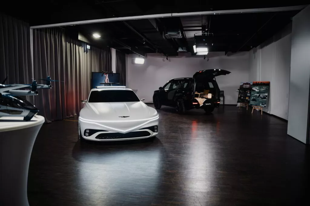 https://www.carscoops.com/wp-content/uploads/webp/2024/04/CDE-2024-Genesis-X-Coupe-Giro-18-1024x683.webp