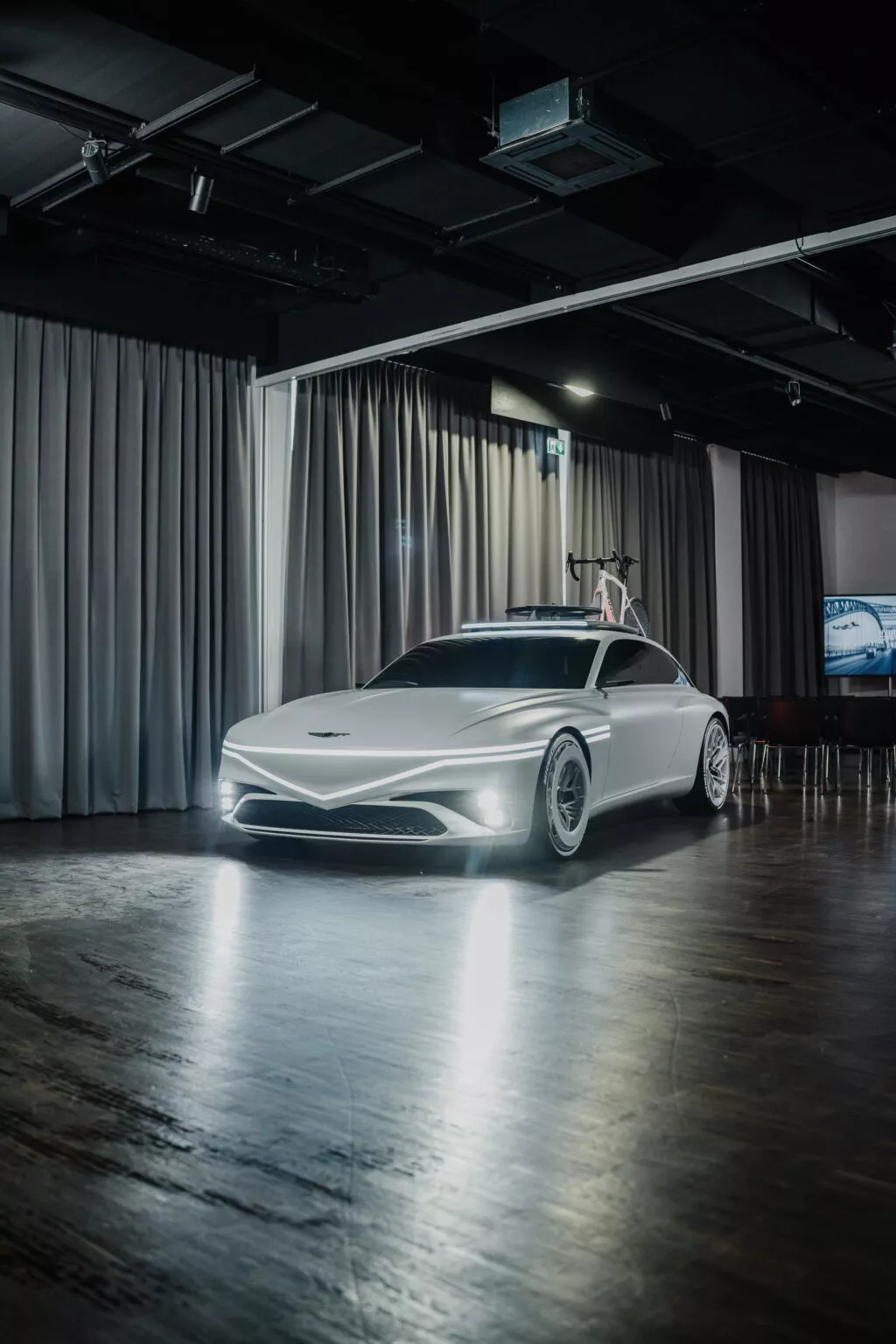 https://www.carscoops.com/wp-content/uploads/webp/2024/04/CDE-2024-Genesis-X-Coupe-Giro-6-1024x1536.webp