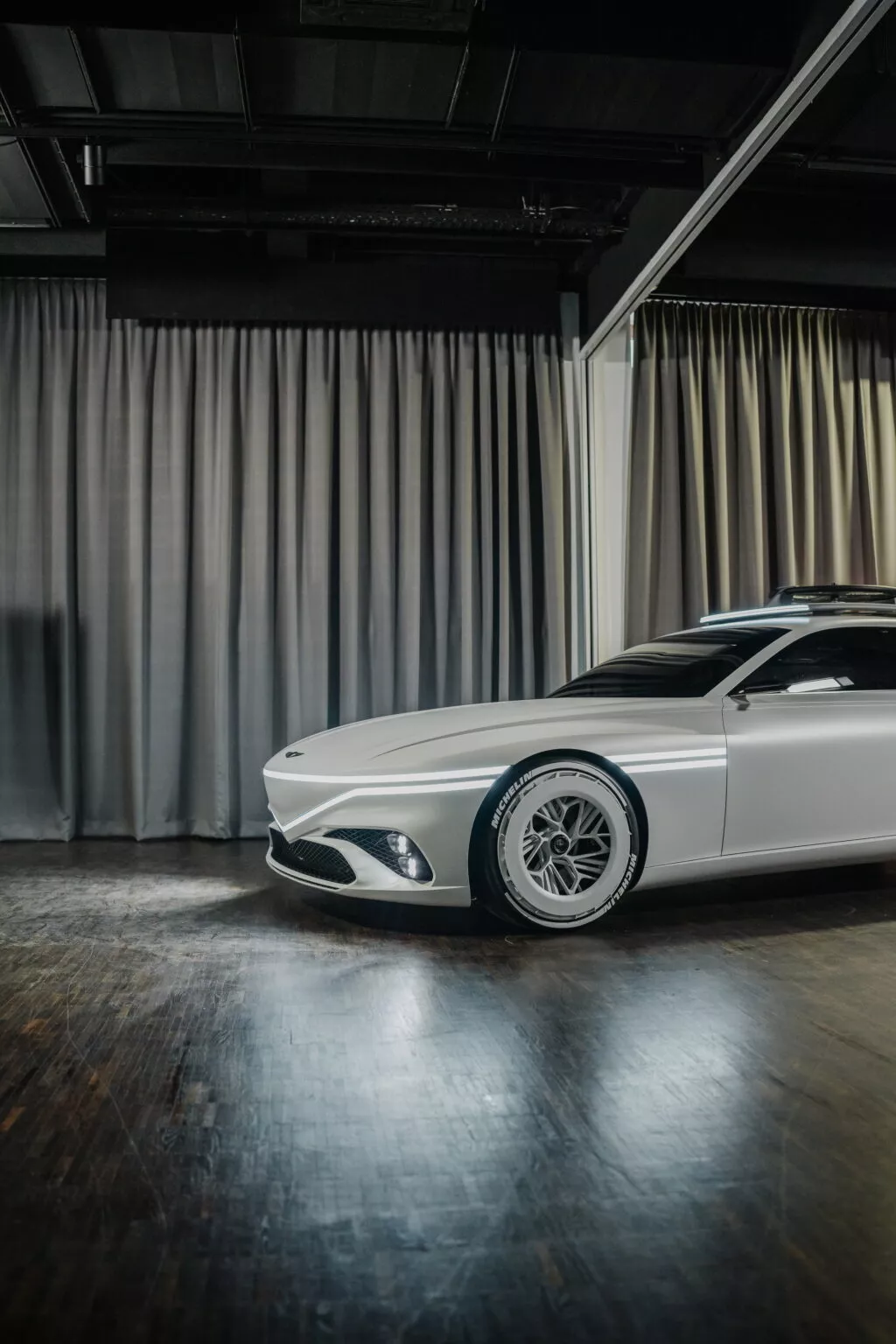 https://www.carscoops.com/wp-content/uploads/webp/2024/04/CDE-2024-Genesis-X-Coupe-Giro-8-1024x1536.webp