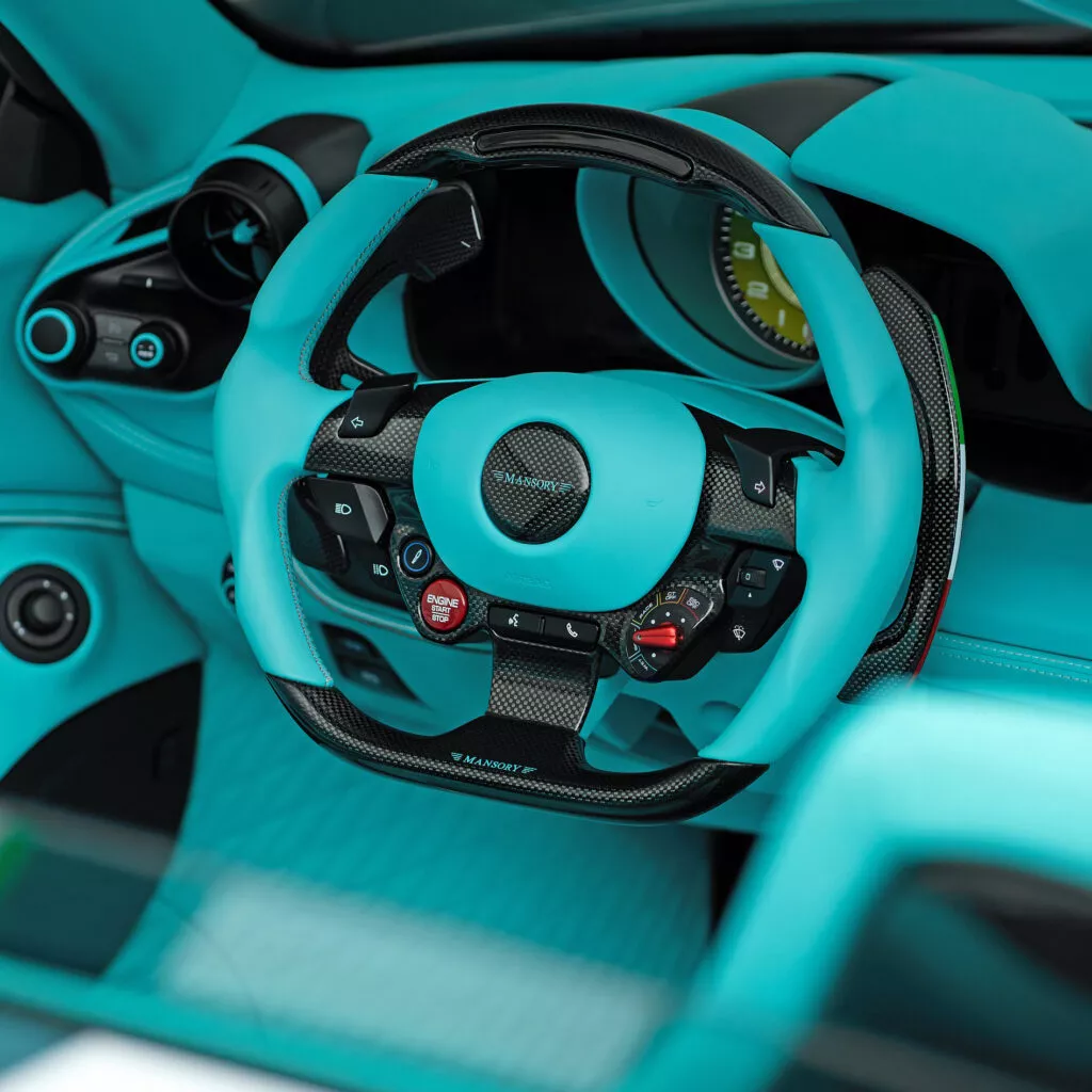 https://www.carscoops.com/wp-content/uploads/webp/2024/06/Mansory-Ferrari-F8-Spider-2-1024x1024.webp