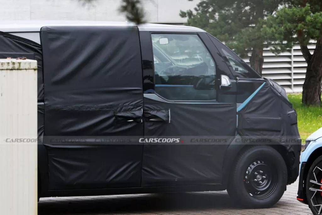 https://www.carscoops.com/wp-content/uploads/webp/2024/07/Kia-PV5-5-1024x683.webp