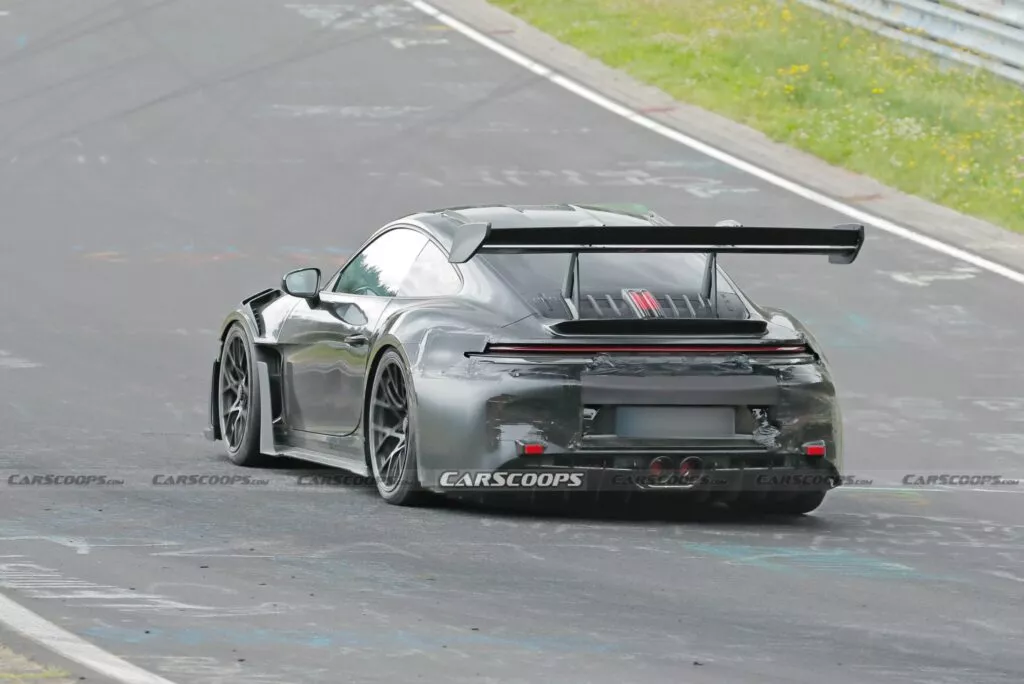 https://www.carscoops.com/wp-content/uploads/webp/2024/08/Porsche-911-992.2-GT3-RS-facelift-track-00016-1024x684.webp