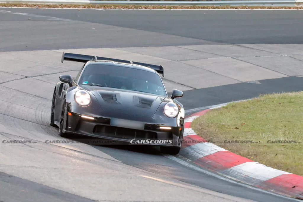 https://www.carscoops.com/wp-content/uploads/webp/2024/11/Porsche-911-GT3-RS-spy-shots-00007-1024x684.webp