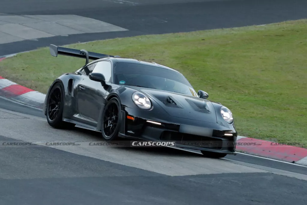 https://www.carscoops.com/wp-content/uploads/webp/2024/11/Porsche-911-GT3-RS-spy-shots-00008-1024x684.webp