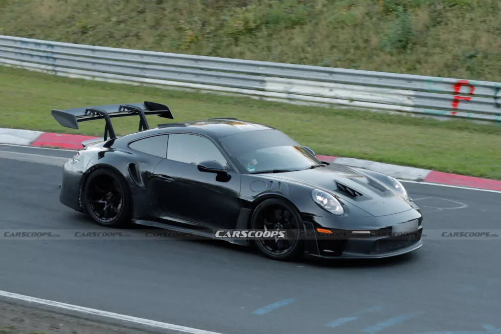 https://www.carscoops.com/wp-content/uploads/webp/2024/11/Porsche-911-GT3-RS-spy-shots-00009-1024x684.webp