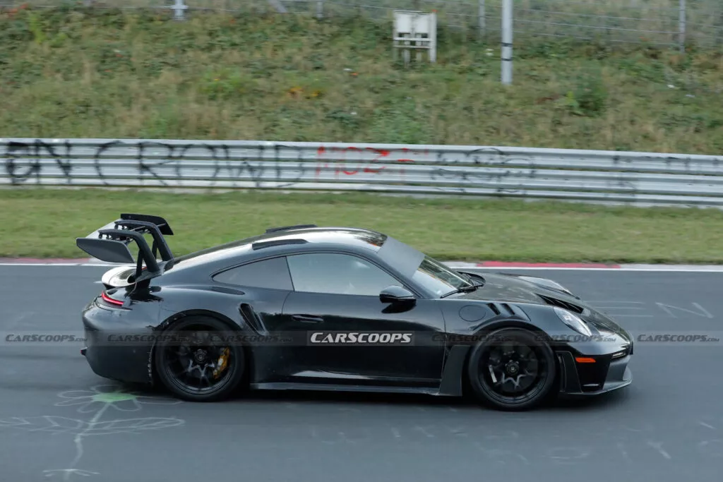 https://www.carscoops.com/wp-content/uploads/webp/2024/11/Porsche-911-GT3-RS-spy-shots-00010-1024x683.webp