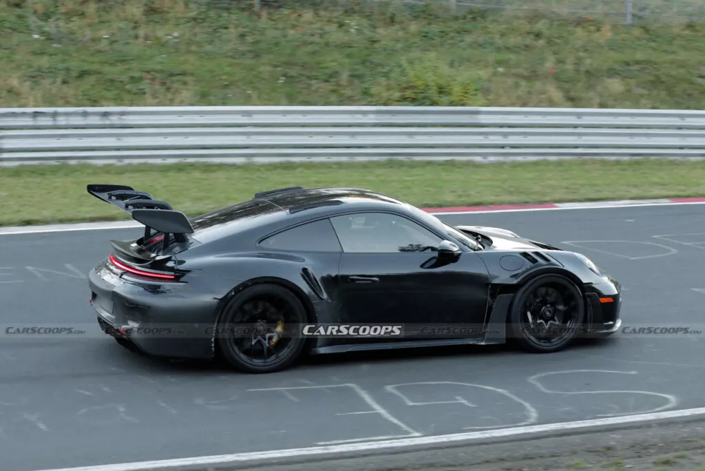 https://www.carscoops.com/wp-content/uploads/webp/2024/11/Porsche-911-GT3-RS-spy-shots-00011-1024x684.webp