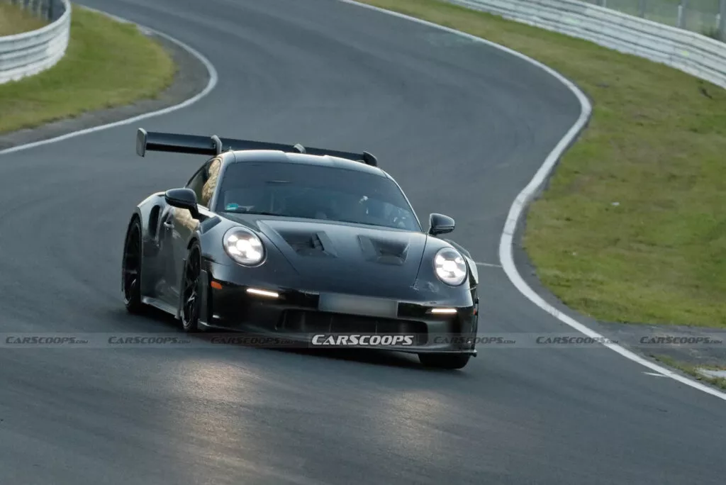 https://www.carscoops.com/wp-content/uploads/webp/2024/11/Porsche-911-GT3-RS-spy-shots-00013-1024x684.webp