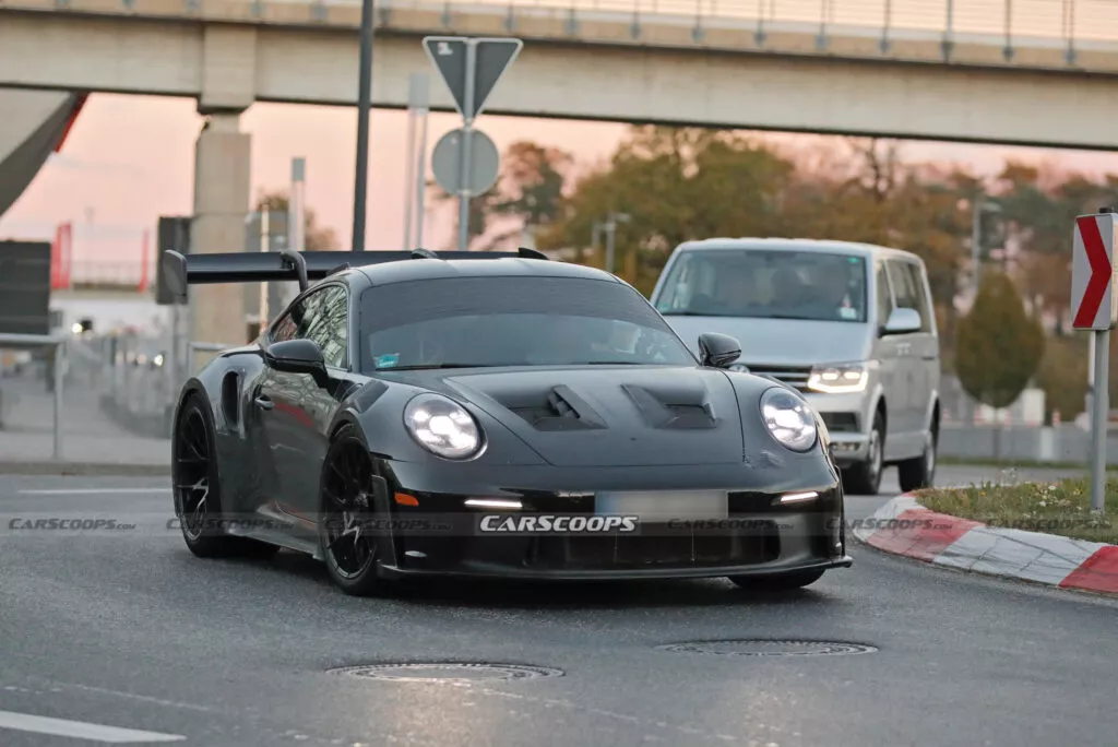 https://www.carscoops.com/wp-content/uploads/webp/2024/11/Porsche-911-GT3-RS-spy-shots-00017-1024x684.webp