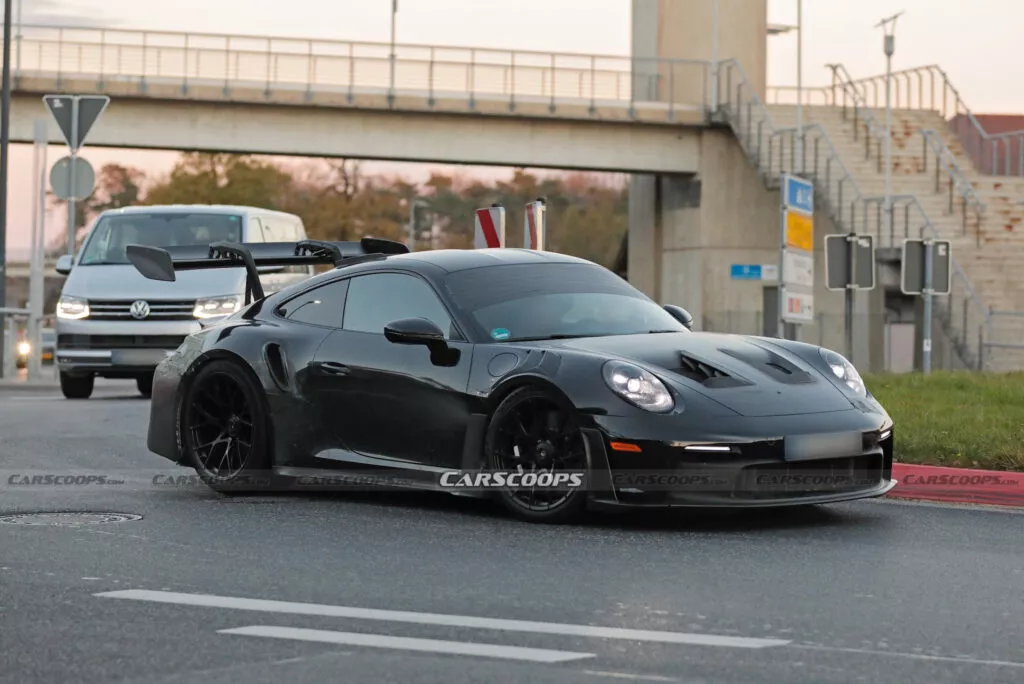 https://www.carscoops.com/wp-content/uploads/webp/2024/11/Porsche-911-GT3-RS-spy-shots-00018-1024x684.webp